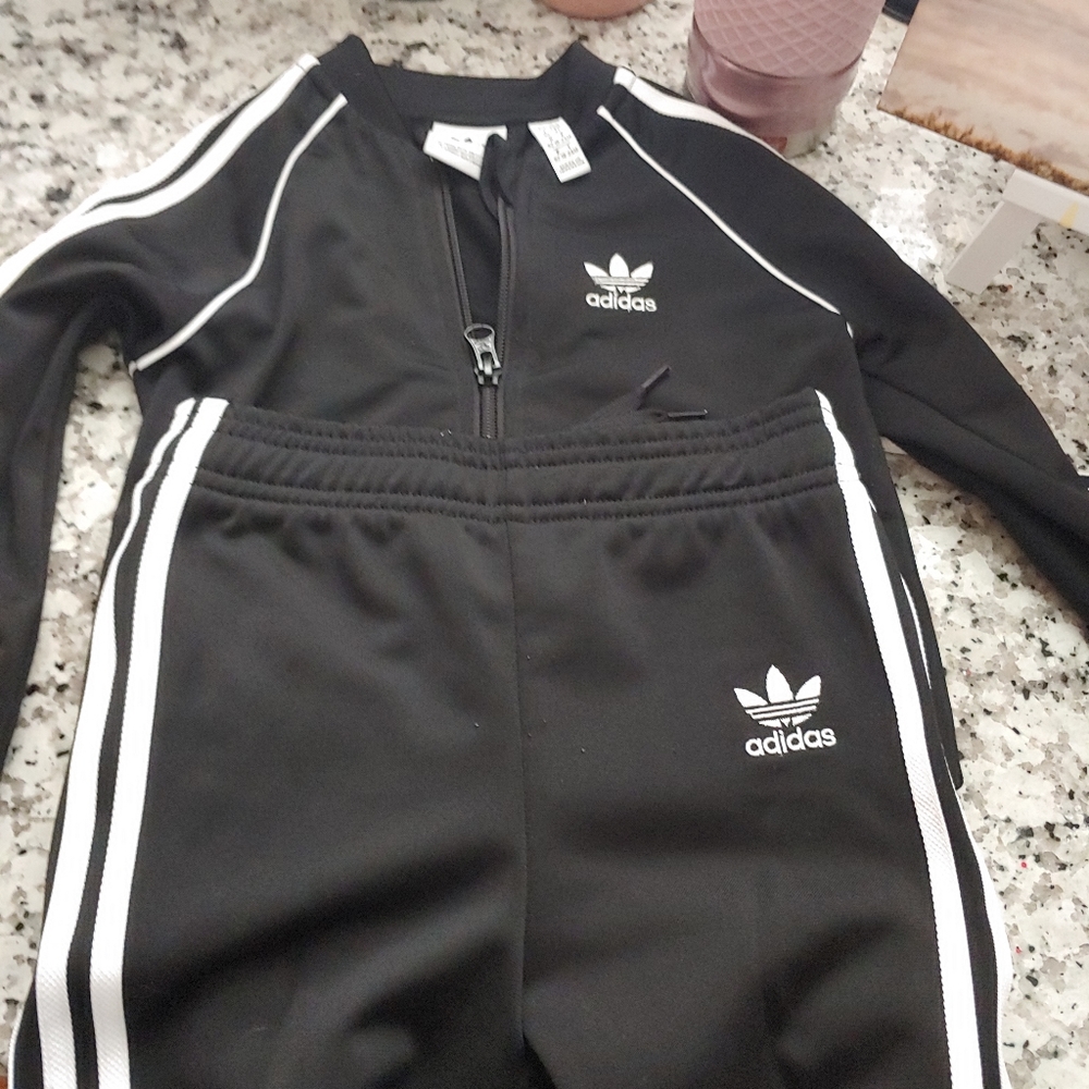 Addias track suit